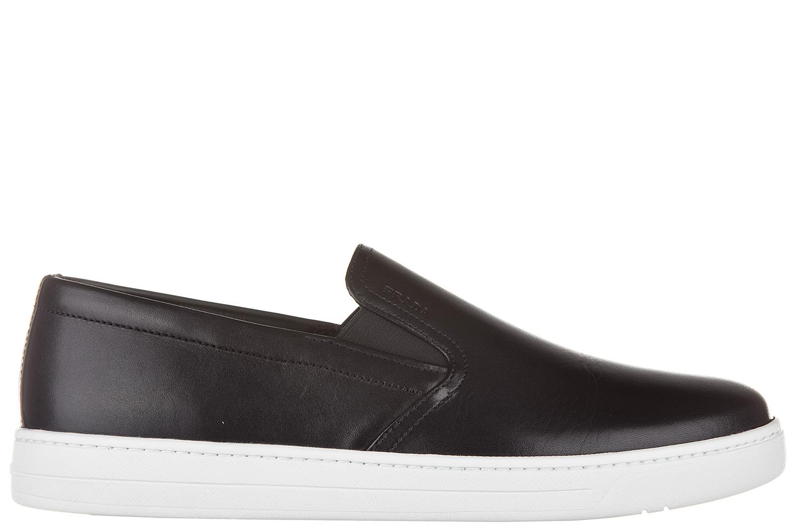 black sole slip on sneakers