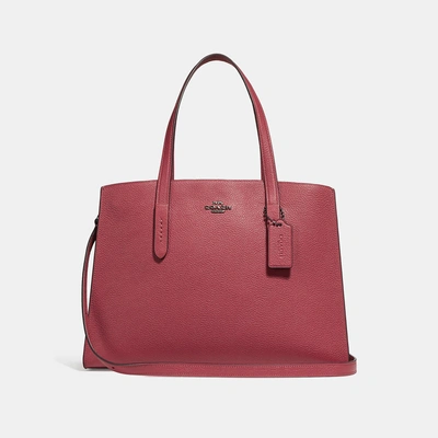 Shop Coach Charlie Carryall - Women's In Washed Red/dark Gunmetal