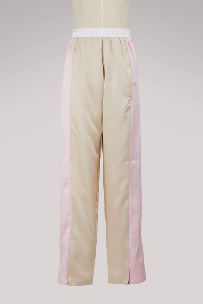 Shop Koché Track Pants In Beige/pink