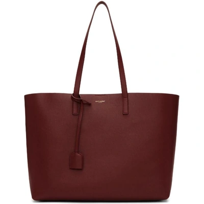 Shop Saint Laurent Burgundy East West Shopping Tote In 6219 Paliss