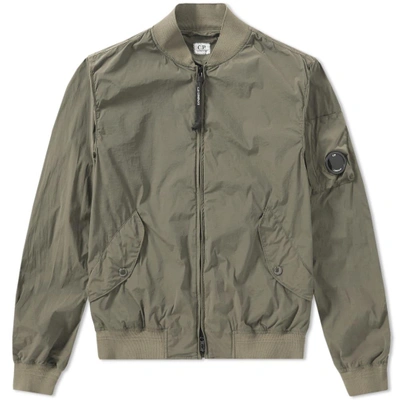C.p. Company Nycra Stretch Arm Lens Bomber Jacket In Green | ModeSens