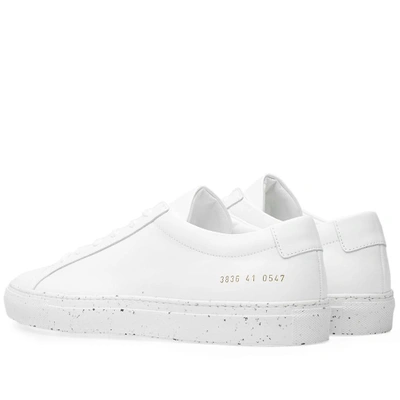 Shop Common Projects Woman By  Achilles Low Confetti Sole In White