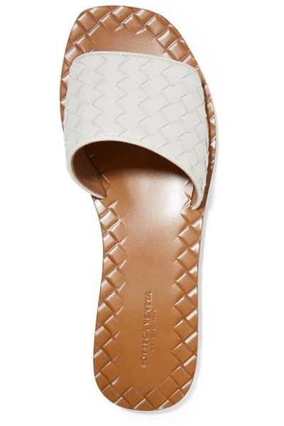 Shop Bottega Veneta Intrecciato Leather Slides In White