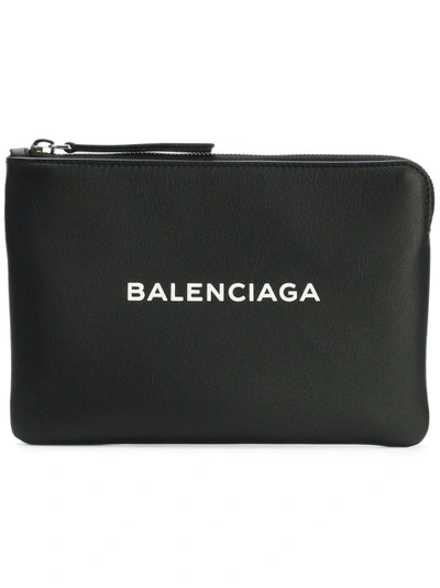 Shop Balenciaga Logo Clutch Bag In Black