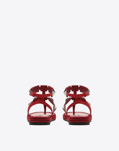 Shop Valentino Rockstud Flat Macro Stud Sandal In Rubin