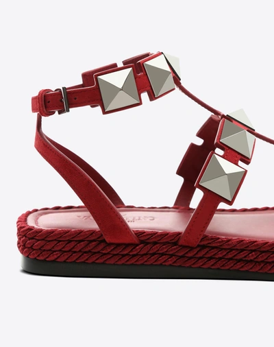Shop Valentino Rockstud Flat Macro Stud Sandal In Rubin