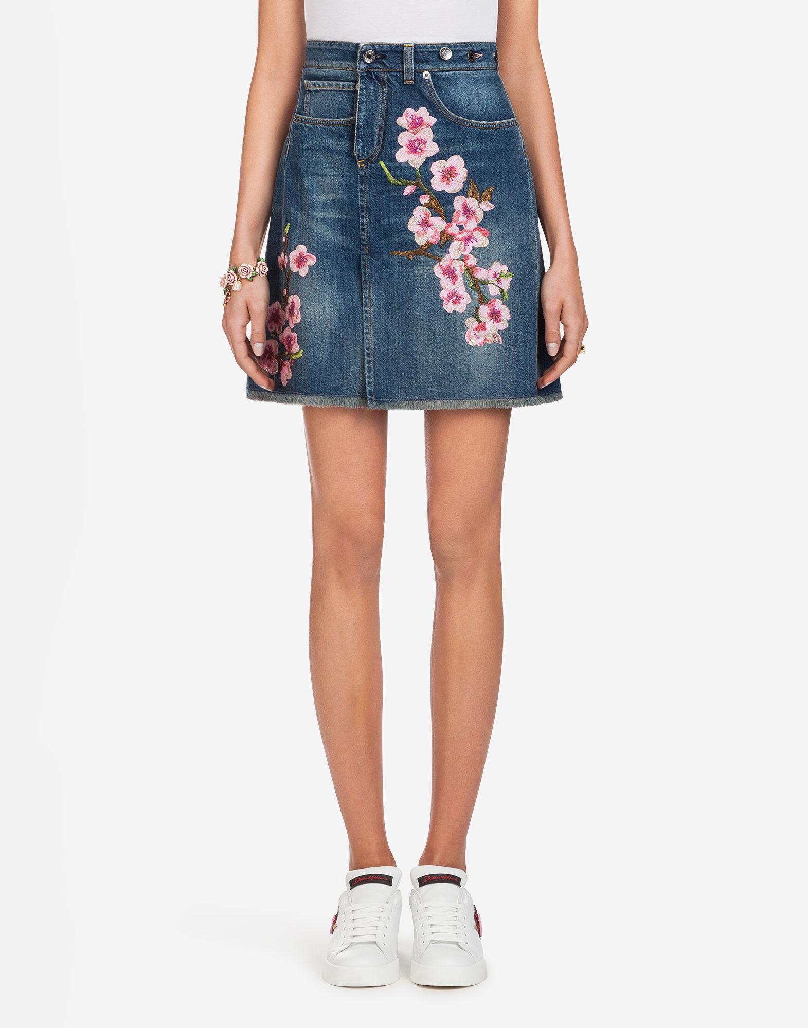 denim skirt with embroidered flowers