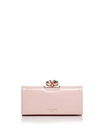 Shop Ted Baker Honeyy Bobble Patent Matinee Wallet In Light Pink/rose Gold