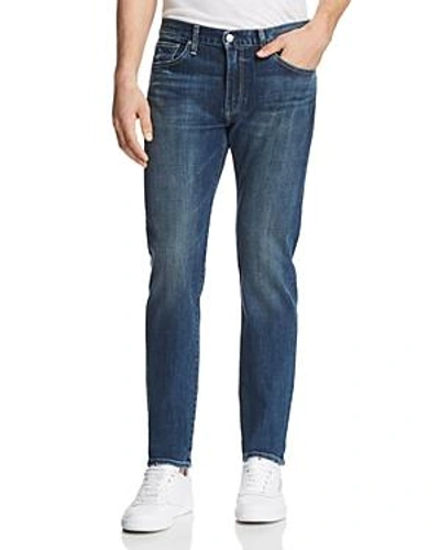 Shop S.m.n Studio Hunter Standard Slim Fit Jeans In Odyssey In Medium Blue