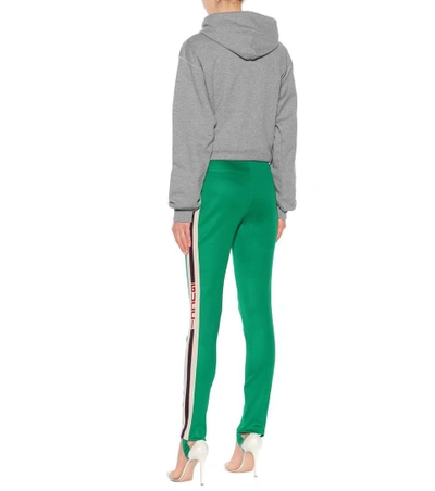 Shop Gucci Striped Jersey Stirrup Trousers In Green