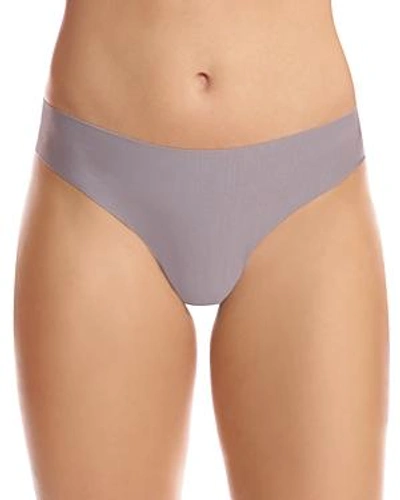 Shop Commando Butter Mid-rise Thong In Stone