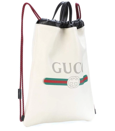 Shop Gucci Printed Leather Drawstring Backpack In White