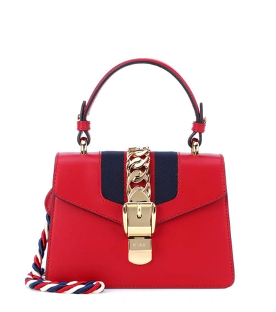 Shop Gucci Sylvie Mini Leather Crossbody Bag In Red