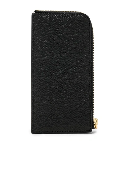 Shop Thom Browne Pebble Grain Half-zip Wallet In Black