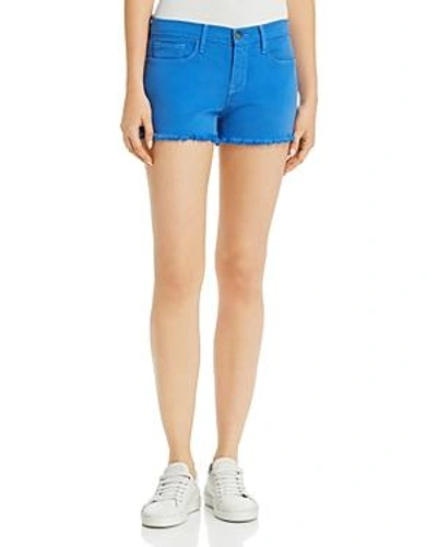 Shop Frame Le Cutoff Frayed Denim Shorts In Coastal Blue