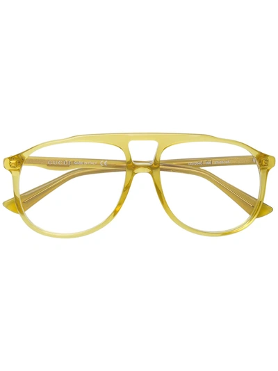 Shop Gucci Eyewear Transparent Aviator Glasses - Yellow