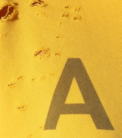 Shop Amiri Printed Cotton-blend Hoodie In Yellow