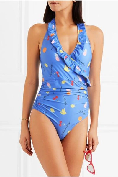 Shop Ganni Dexies Ruffled Printed Halterneck Swimsuit In Light Blue