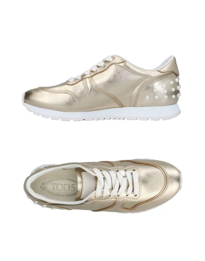 Shop Tod's Woman Sneakers Gold Size 5.5 Soft Leather