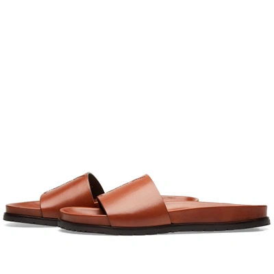 Shop Saint Laurent Ysl Leather Slide In Brown