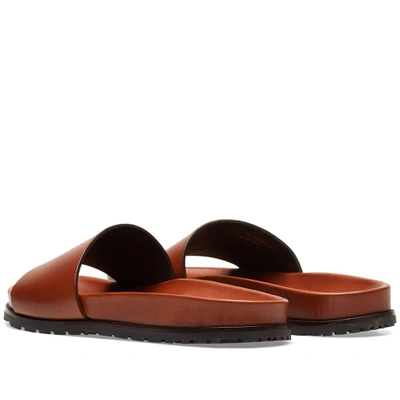 Shop Saint Laurent Ysl Leather Slide In Brown