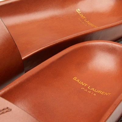 Shop Saint Laurent Ysl Leather Slide In Brown