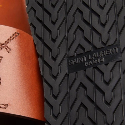 Shop Saint Laurent Ysl Leather Slide In Brown