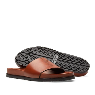 Shop Saint Laurent Ysl Leather Slide In Brown