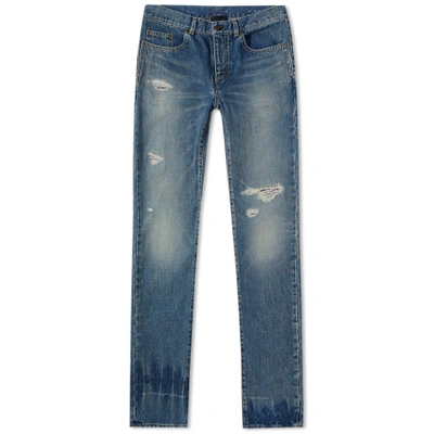 Shop Saint Laurent Low Rise Skinny Trash Jean In Blue