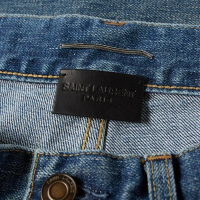 Shop Saint Laurent Low Rise Skinny Trash Jean In Blue