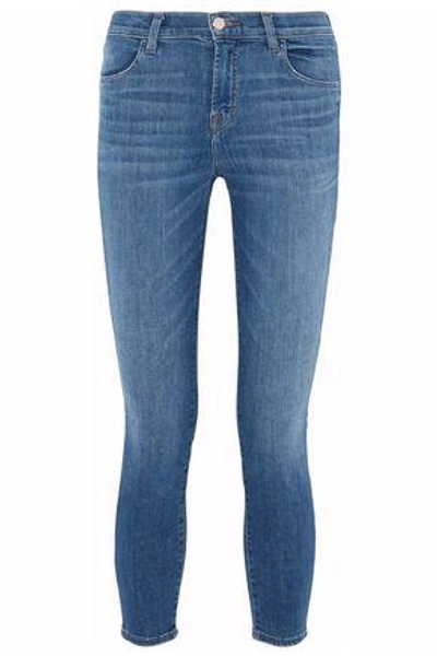 Shop J Brand Cropped Faded Mid-rise Skinny Jeans In Mid Denim