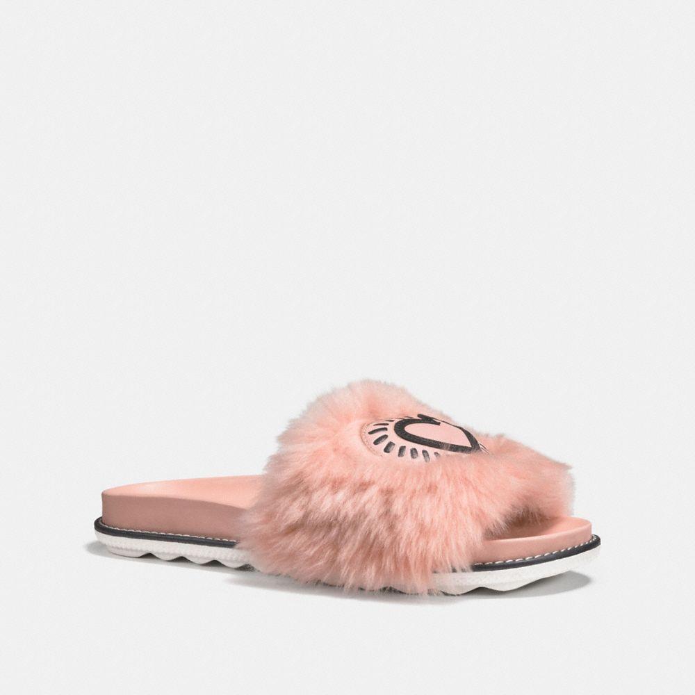 coach fur slides
