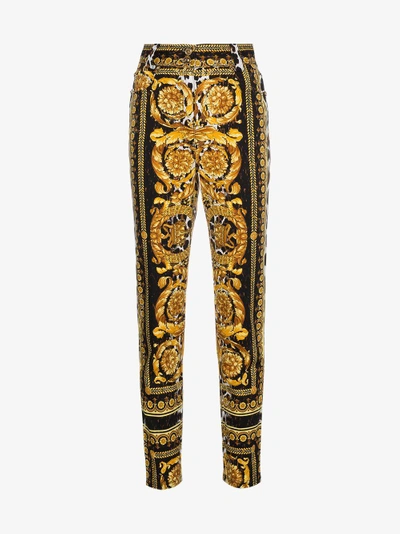 Shop Versace High Waist Patterned Skinny Jeans In Yellow&orange