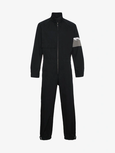 Shop Prada Jumpsuit With Armband Graphic In Black