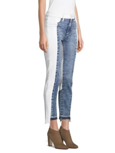 Shop Paige Hoxton Pieced Step Hem Skinny Jeans In Agnes