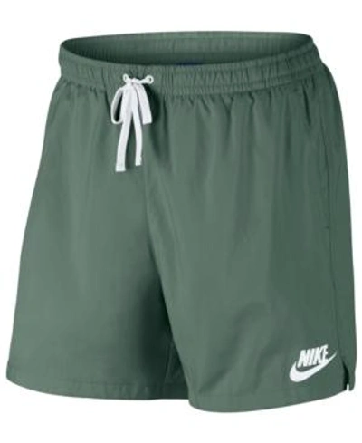 Shop Nike Men's Sportswear Shorts In Clay Green/white