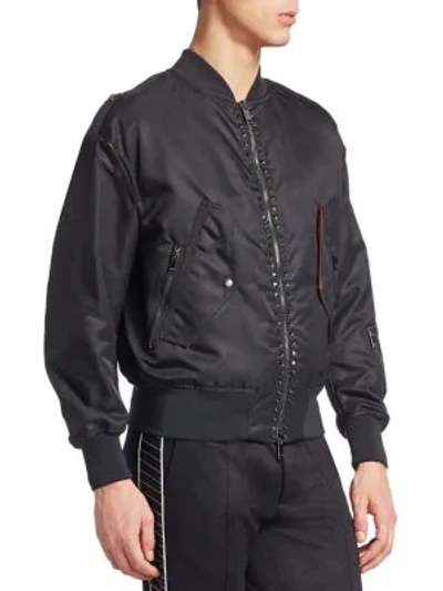 Shop Valentino Studded Bomber Jacket In Black