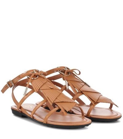 Shop Tod's Fringed Leather Sandals In Brown