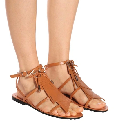 Shop Tod's Fringed Leather Sandals In Brown