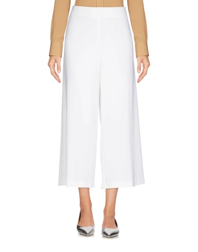 Shop Pinko Cropped Pants & Culottes In White