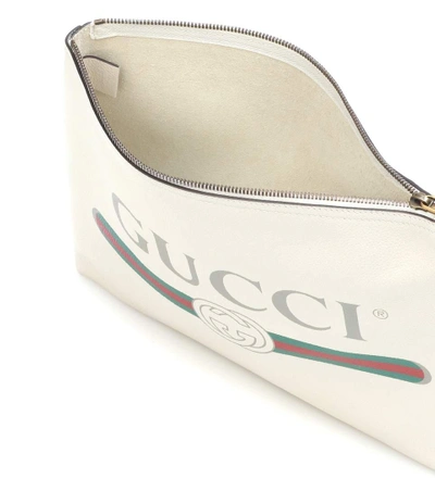 Shop Gucci Printed Leather Clutch In White
