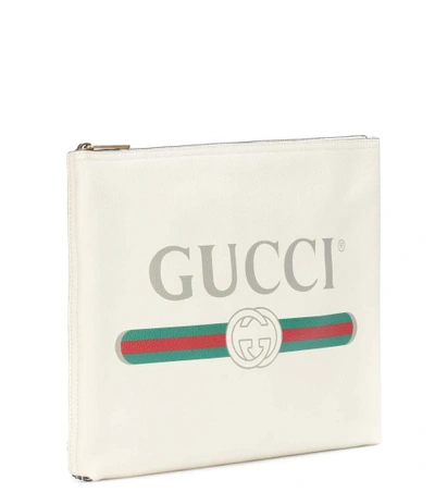 Shop Gucci Printed Leather Clutch In White