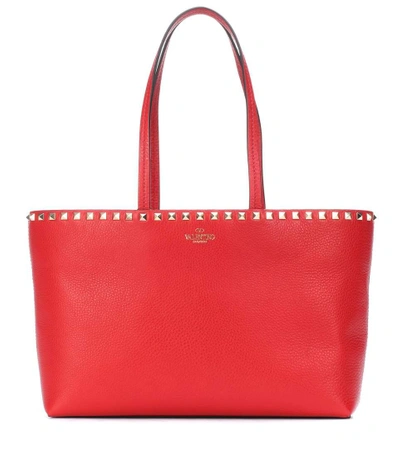 Shop Valentino Rockstud Leather Shopper In Red