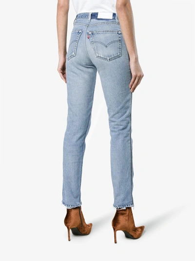 Shop Re/done Mid Rise Ankle Zip Slim Jeans In Blue
