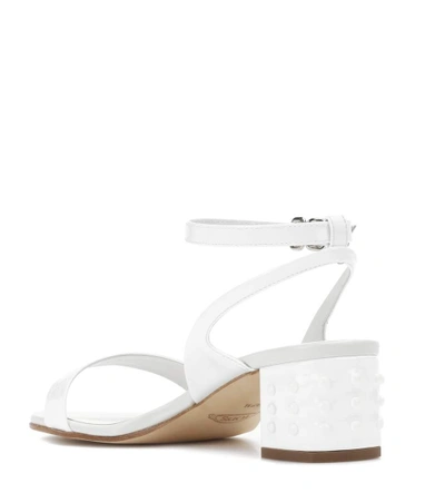Shop Tod's Patent Leather Sandals In White