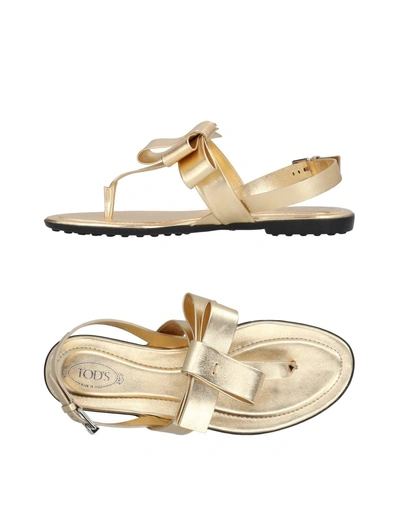 Shop Tod's Flip Flops In Sand