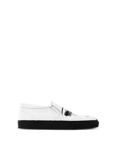 Shop Moschino Sneakers In White