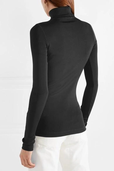 Shop Goldsign The Rib Stretch Cotton-blend Turtleneck Top In Black