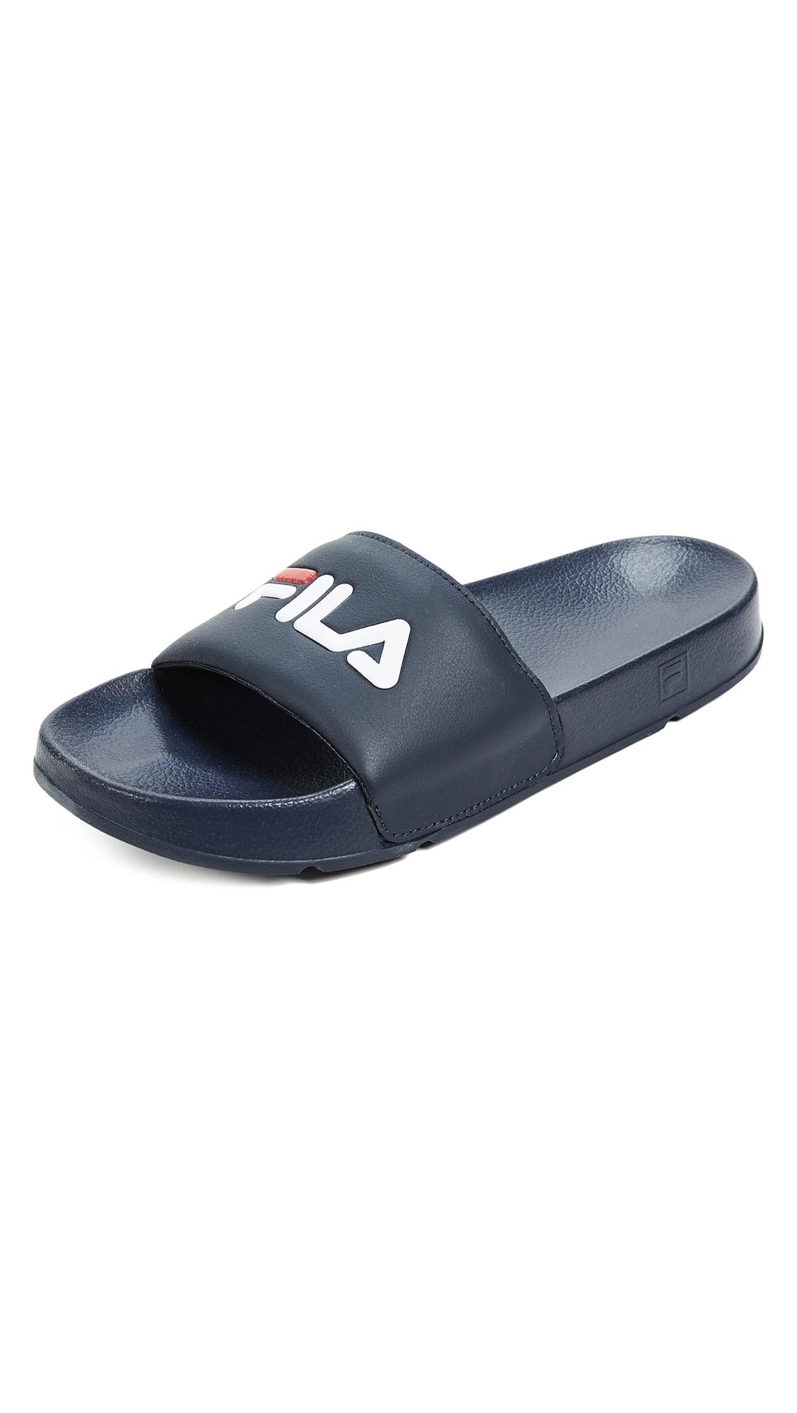 navy blue fila slides