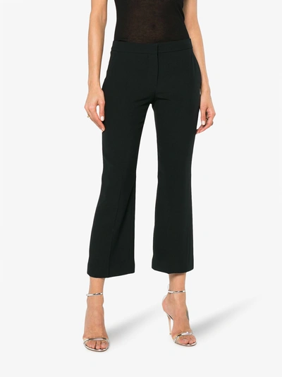Shop Alexander Mcqueen Kick-flare Cropped Trousers In Black